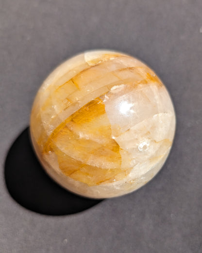 Yellow flower Calcite sphere from Madagascar 436g