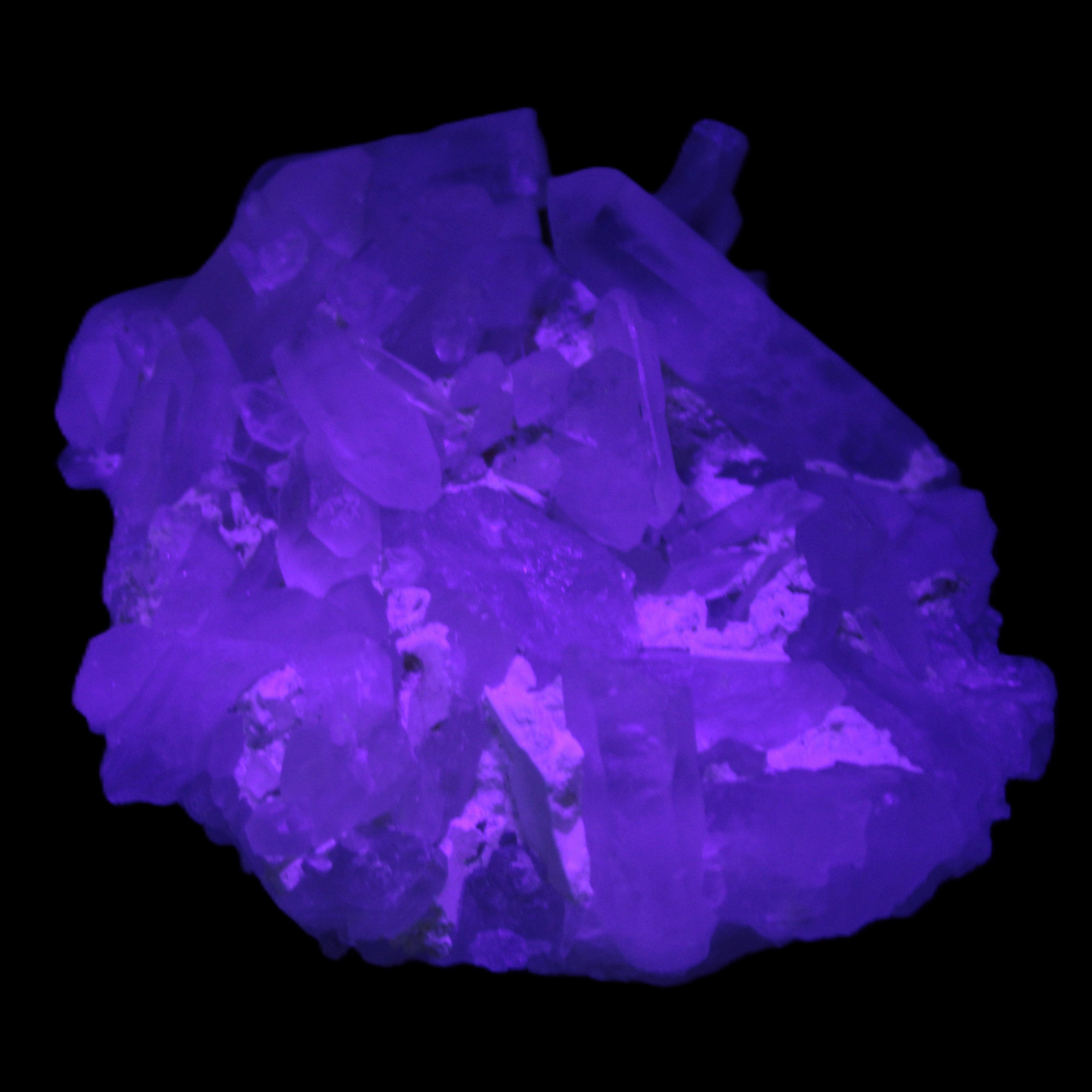 Clear Quartz cluster 100*77*33mm 242g in UV light - Rocks and Things Store