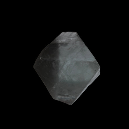 Fluorite octahedral crystal 26/33g  in dull sunlight - Rocks and Things Store