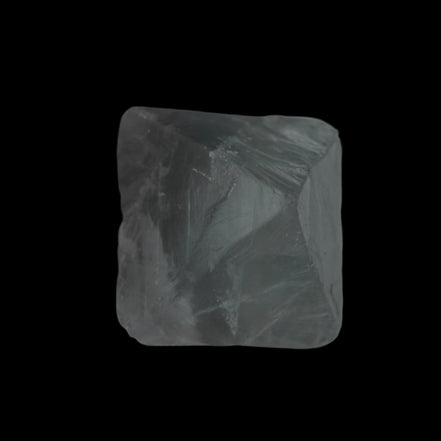 Fluorite octahedral crystal 26/33g  in dull sunlight - Rocks and Things Store