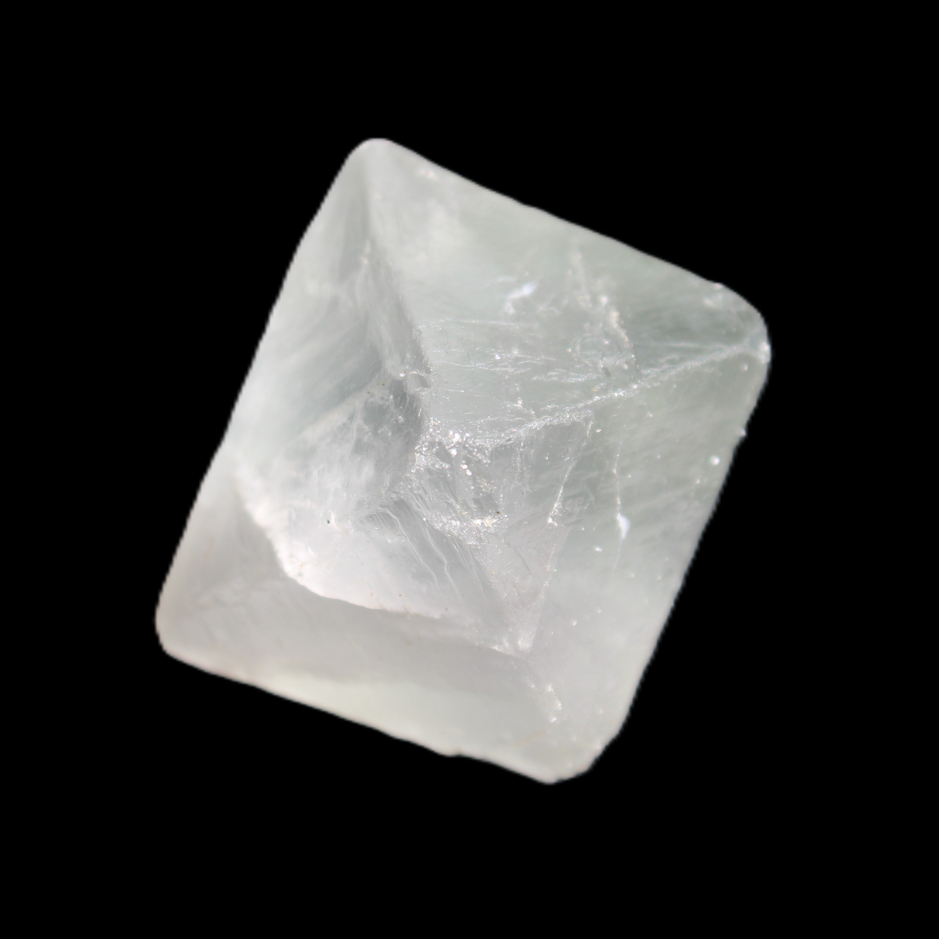 Fluorite octahedral crystal 26/33g in sunlight - Rocks and Things Store