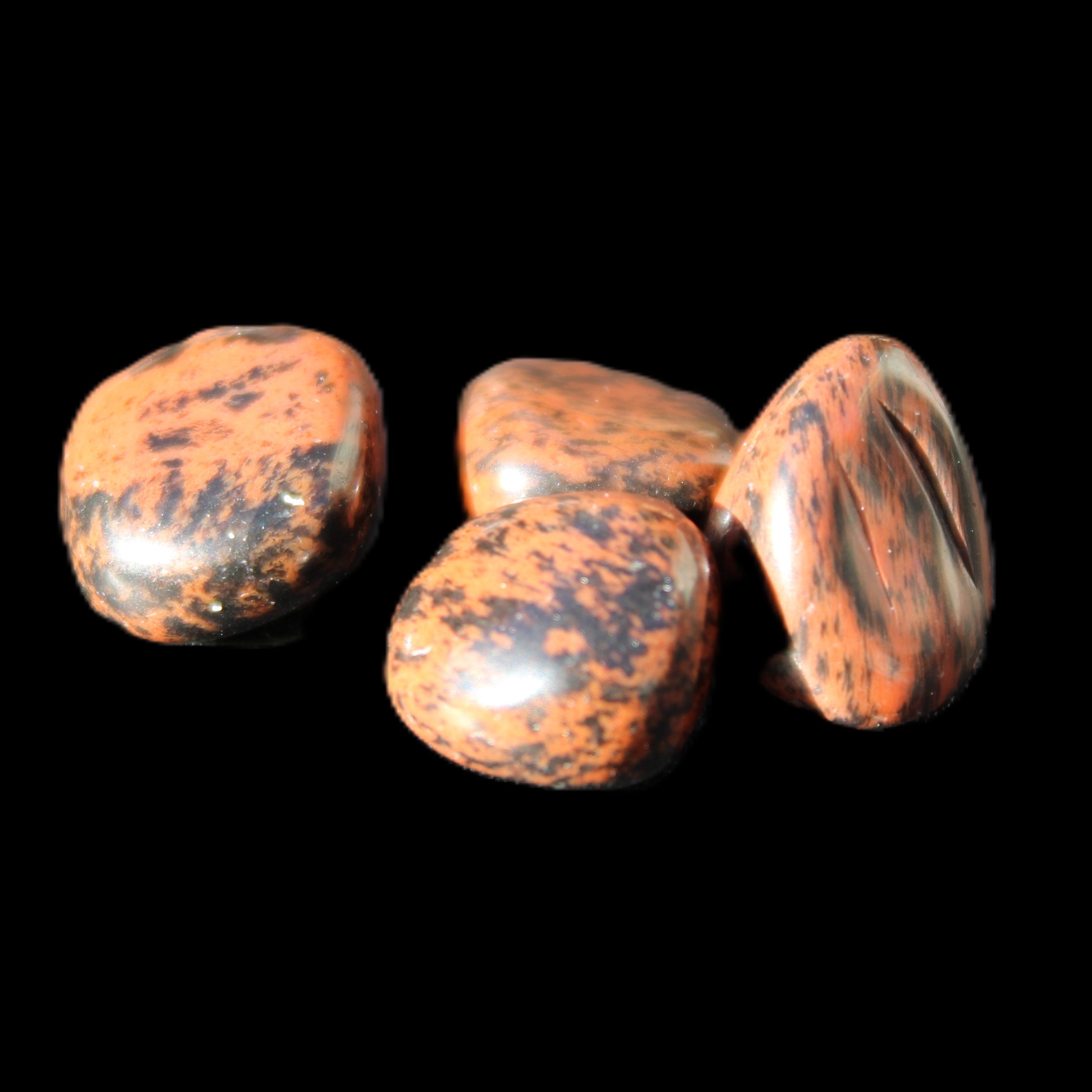 Red Mahogany Obsidian 4/5 stones 6g in sunlight - Rocks and Things Store