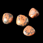 Red Mahogany Obsidian 4/5 stones 6g in sunlight - Rocks and Things Store