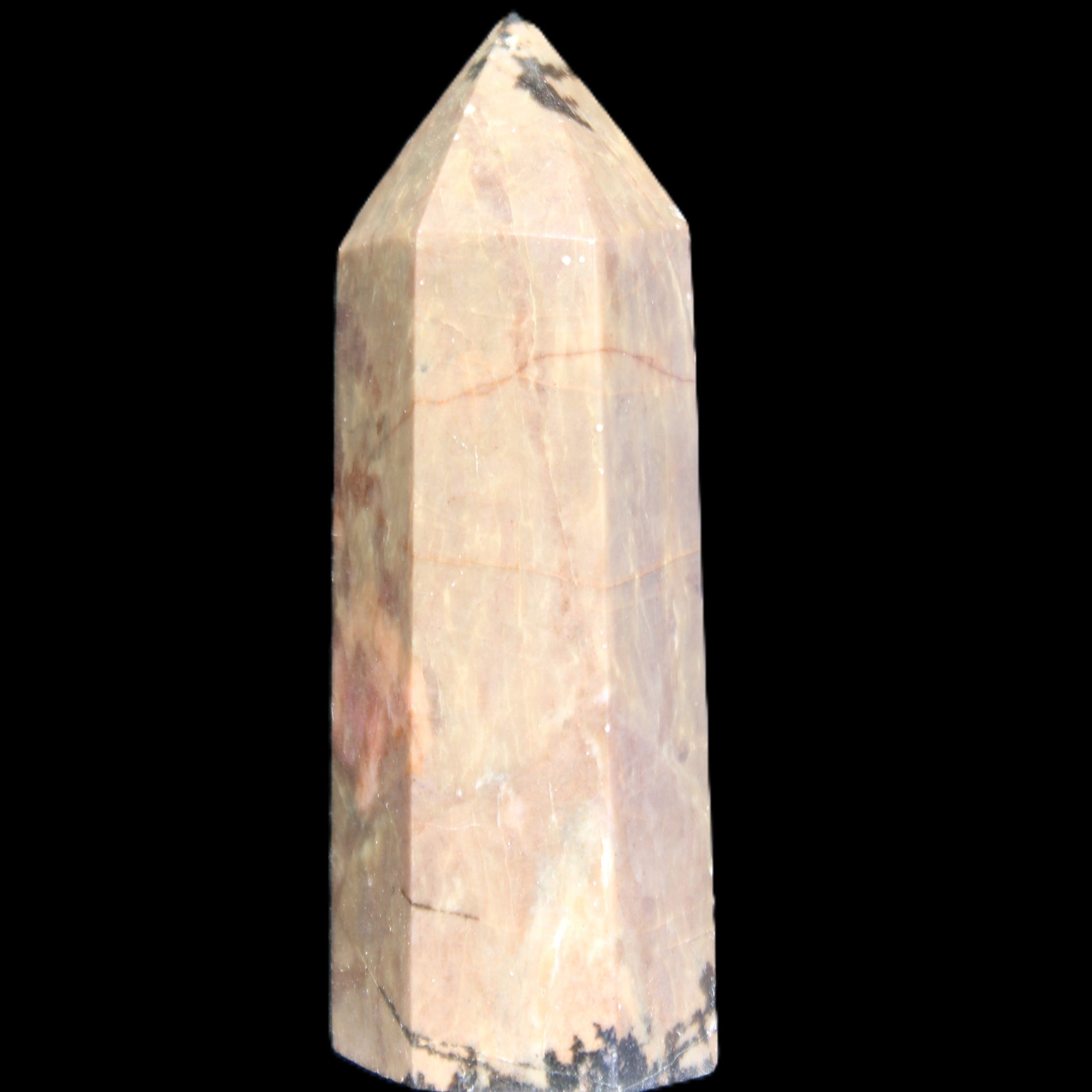 Rhodonite wand 73mm 115g in sunlight - Rocks and Things Store