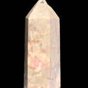 Rhodonite wand 73mm 115g in sunlight - Rocks and Things Store