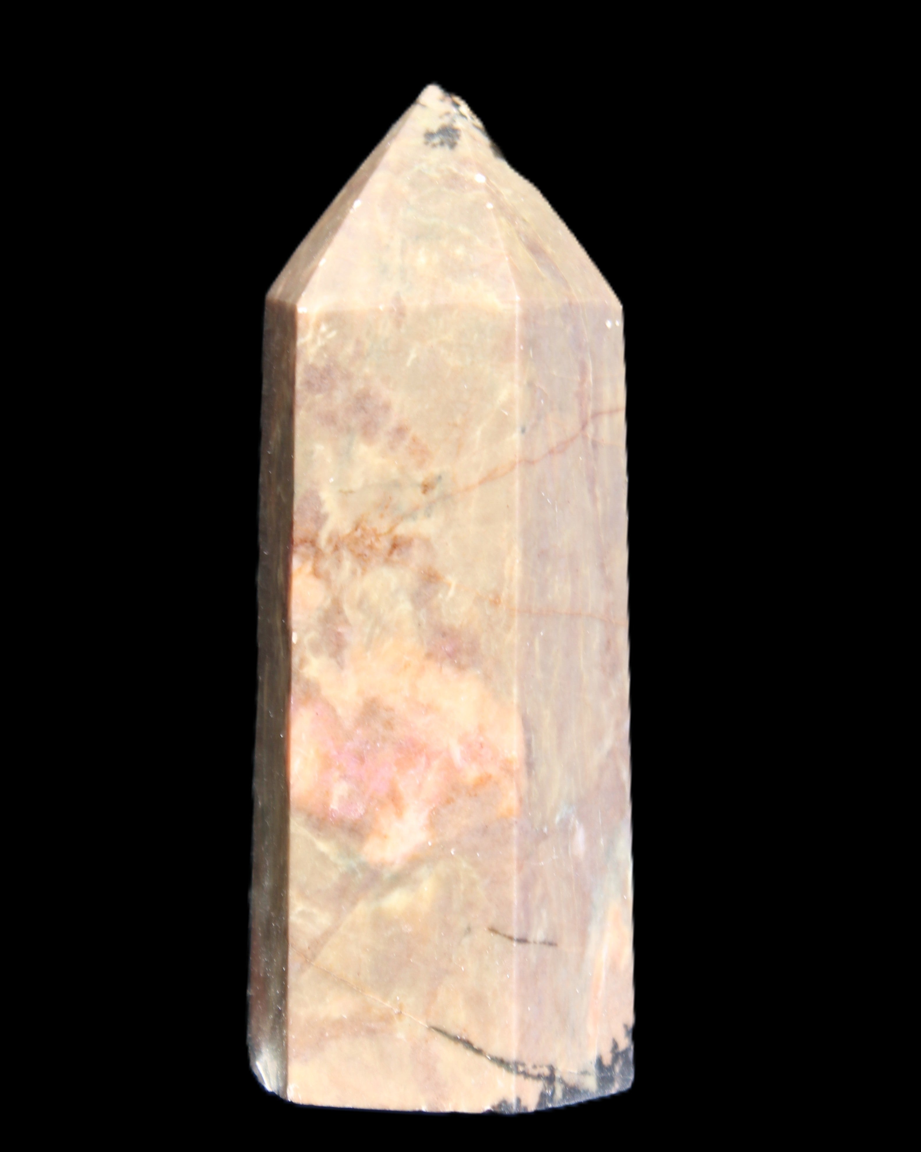 Rhodonite wand 73mm 115g in sunlight - Rocks and Things Store