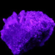 Calcite cluster 75g in UV light - Rocks and Things Store