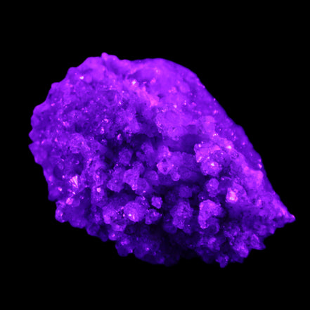 Calcite cluster 75g in UV light - Rocks and Things Store