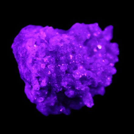 Calcite cluster 75g in UV light - Rocks and Things Store