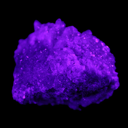 Calcite cluster 75g in UV light - Rocks and Things Store