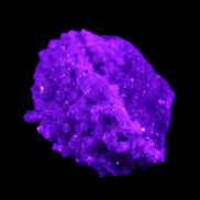 Calcite cluster 75g in UV light - Rocks and Things Store