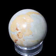 Marine Jasper sphere 51mm 232g in sunlight - Rocks and Things Store