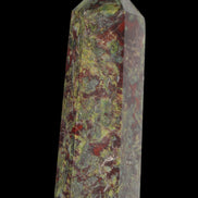 Dragons Blood Stone wand 76g in sun light - Rocks and Things Store