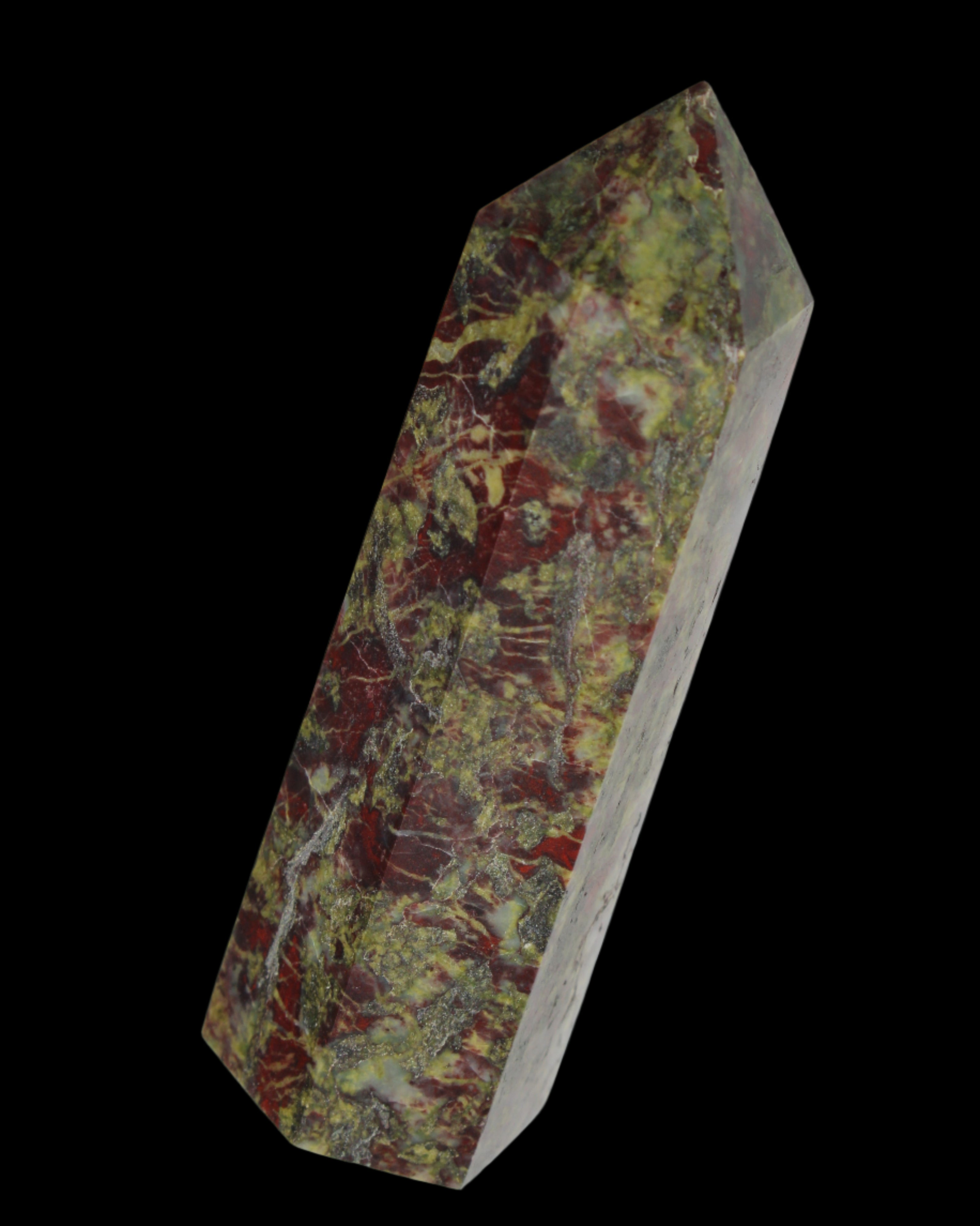 Dragons Blood Stone wand 76g in sun light - Rocks and Things Store