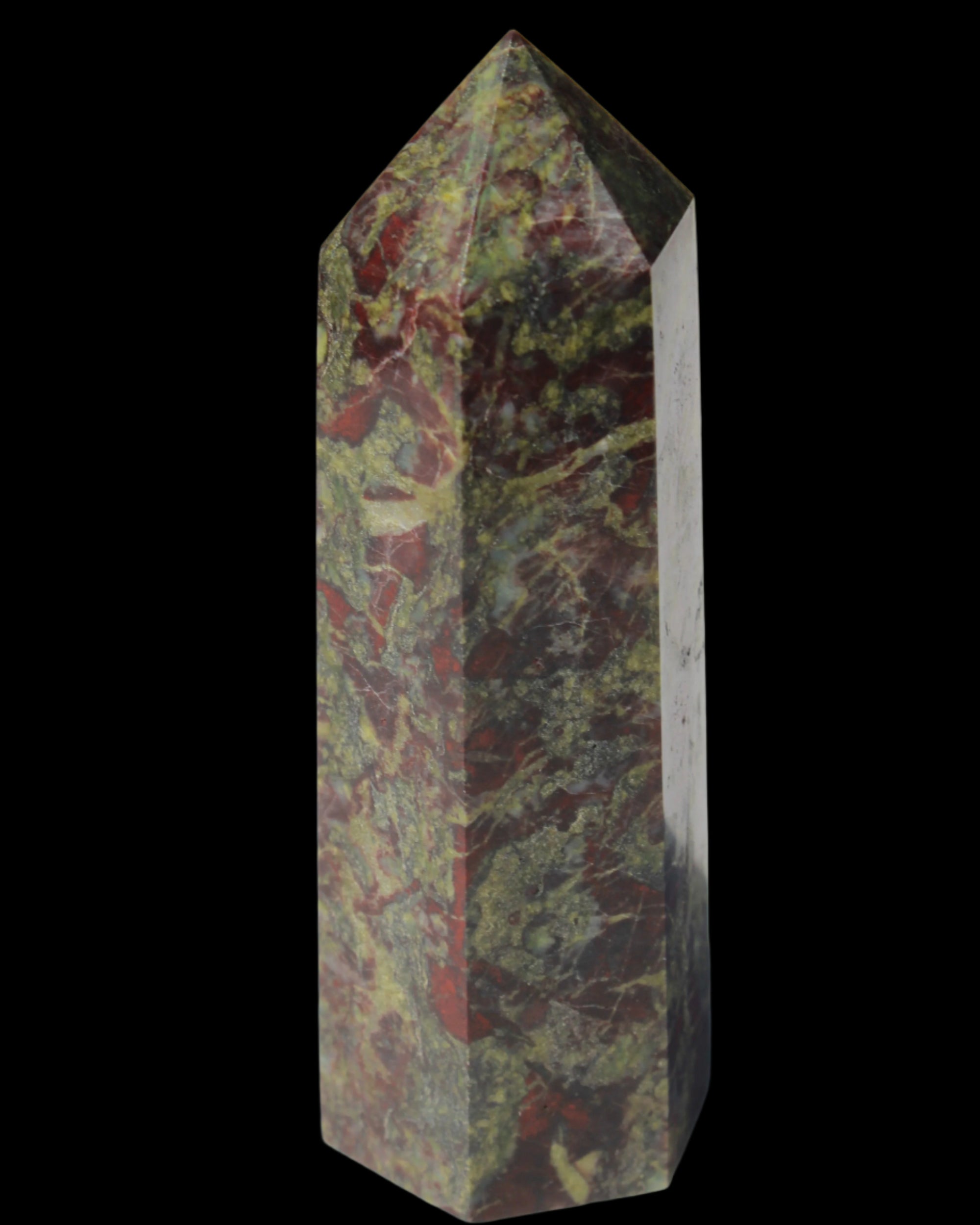 Dragons Blood Stone wand 76g in sun light - Rocks and Things Store
