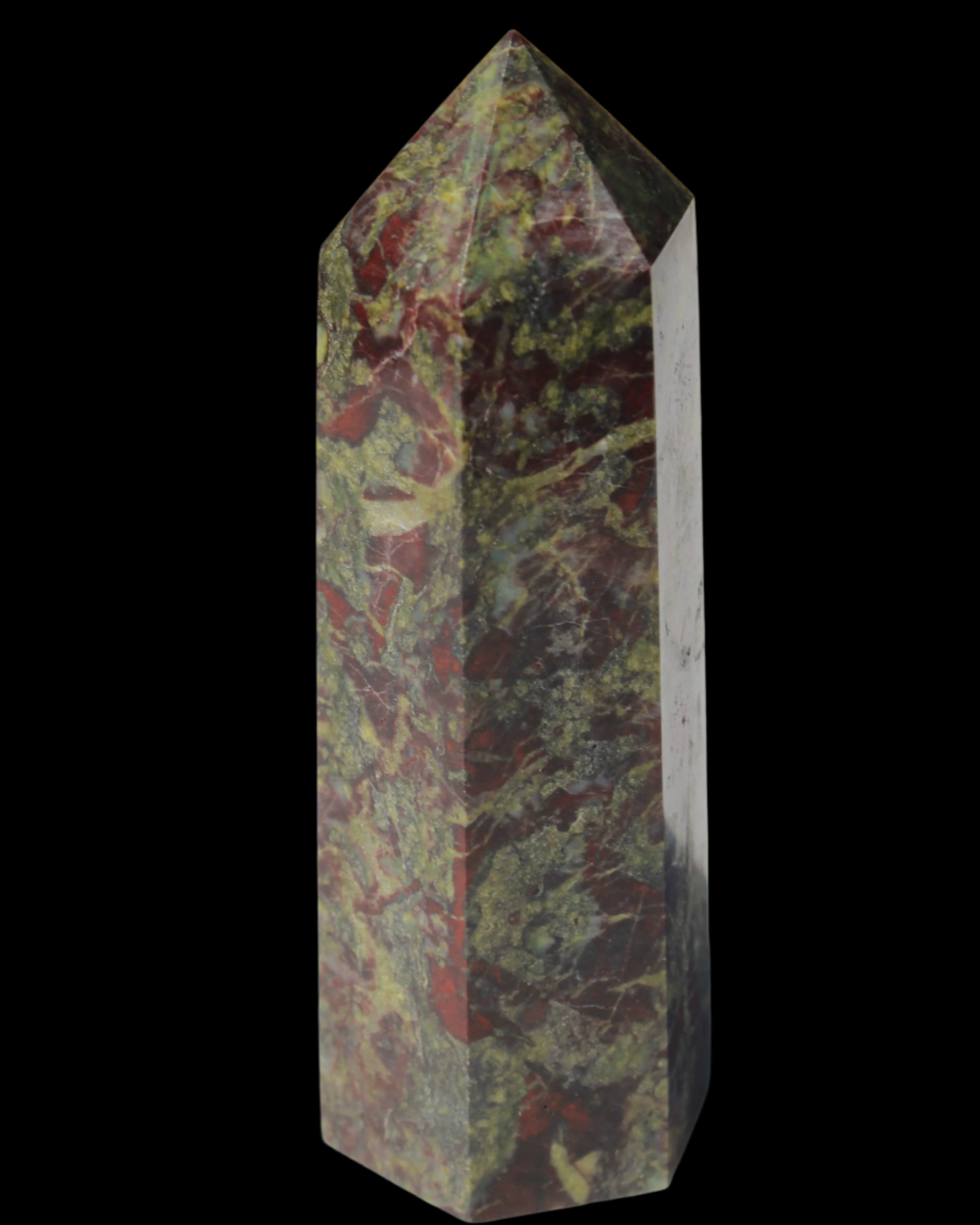 Dragons Blood Stone wand 76g in sun light - Rocks and Things Store