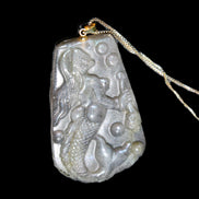 Flashing Labradorite mermaid carved pendant with chain necklace in sunlight - Rocks and Things Store