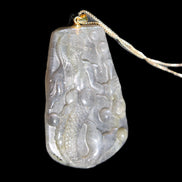 Flashing Labradorite mermaid carved pendant with chain necklace in sunlight - Rocks and Things Store