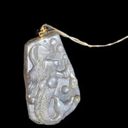 Flashing Labradorite mermaid carved pendant with chain necklace in sunlight - Rocks and Things Store