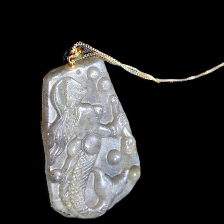 Flashing Labradorite mermaid carved pendant with chain necklace in sunlight - Rocks and Things Store