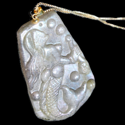 Flashing Labradorite mermaid carved pendant with chain necklace in sunlight - Rocks and Things Store