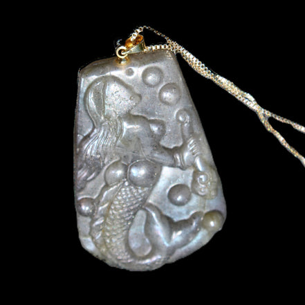 Flashing Labradorite mermaid carved pendant with chain necklace in sunlight - Rocks and Things Store