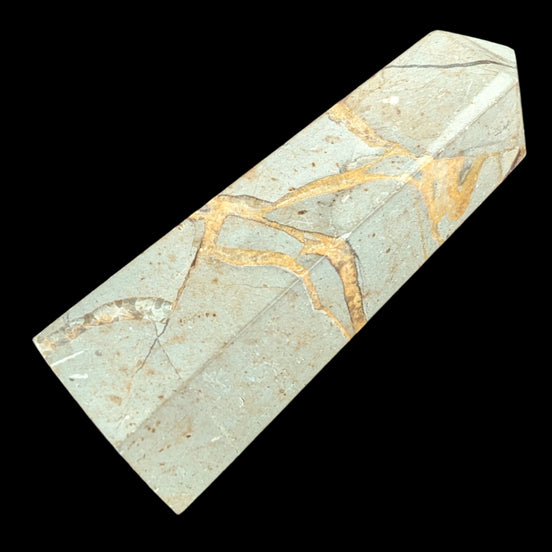 Septarian Dragon Stone wand 90g in sunlight - Rocks and Things Store