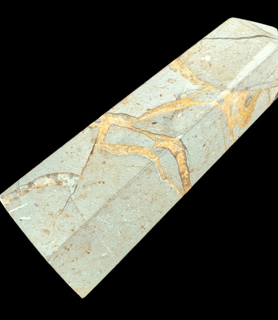 Septarian Dragon Stone wand 90g in sunlight - Rocks and Things Store