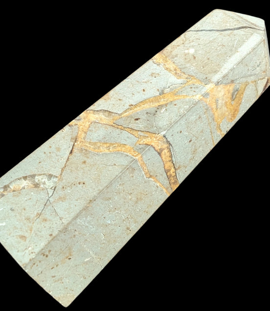 Septarian Dragon Stone wand 90g in sunlight - Rocks and Things Store