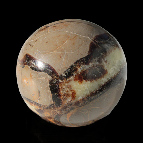 Septarian Dragon Stone sphere 47mm 144g in sunlight - Rocks and Things Store