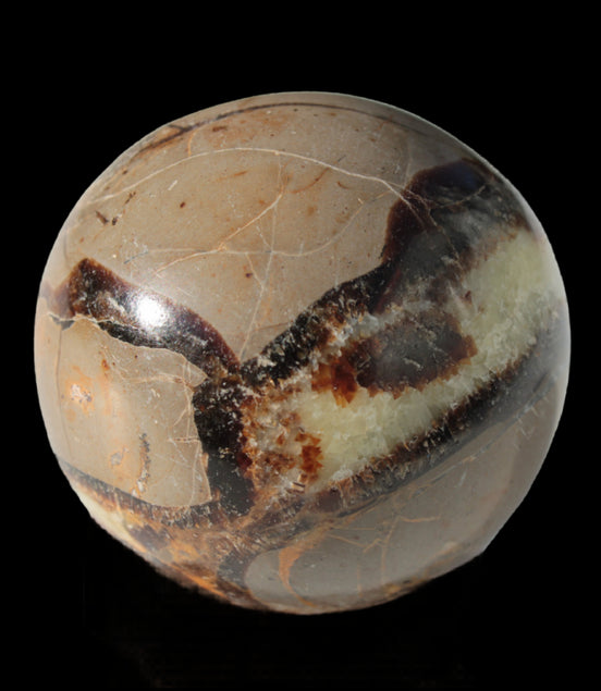 Septarian Dragon Stone sphere 47mm 144g in sunlight - Rocks and Things Store