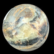 Septarian Dragon Stone sphere 55mm 244g in sunlight - Rocks and Things Store