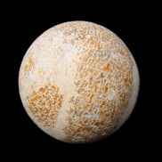 Dinosaur Bone fossil sphere 51mm 166g in sunlight - Rocks and Things Store