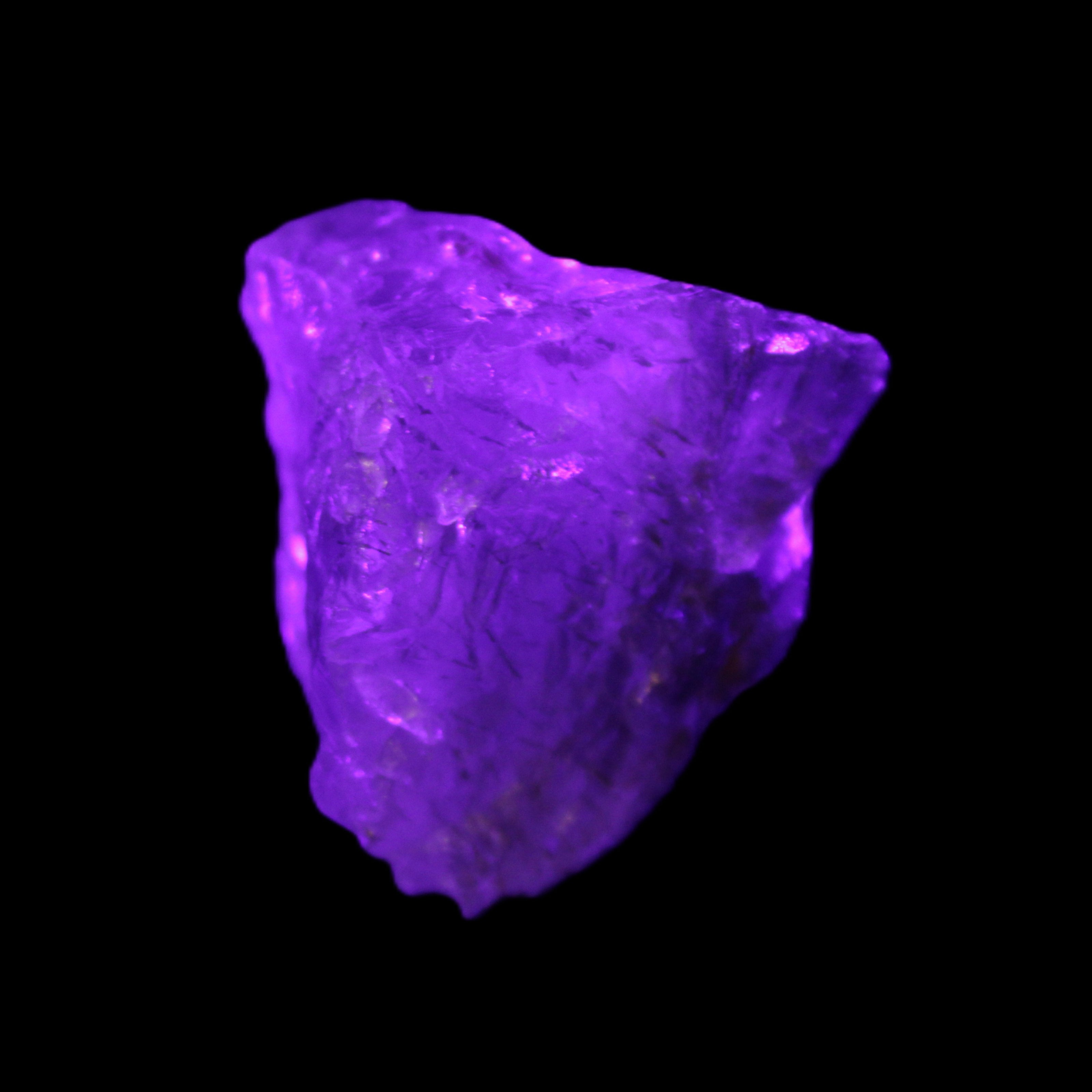 Green Phantom Fluorite crystal from China 60g in UV light - Rocks and Things Store