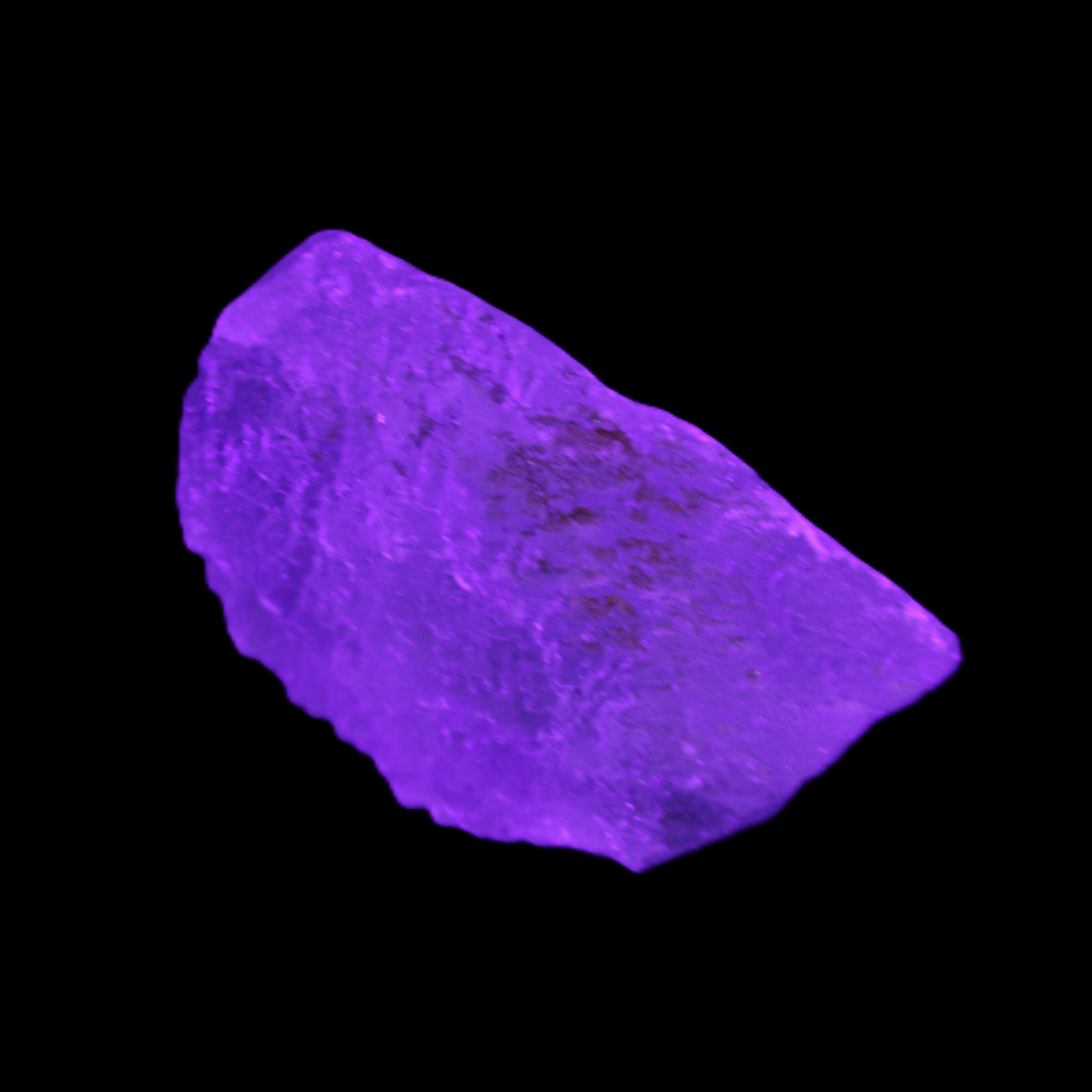 Green Phantom Fluorite crystal from China 60g in UV light - Rocks and Things Store