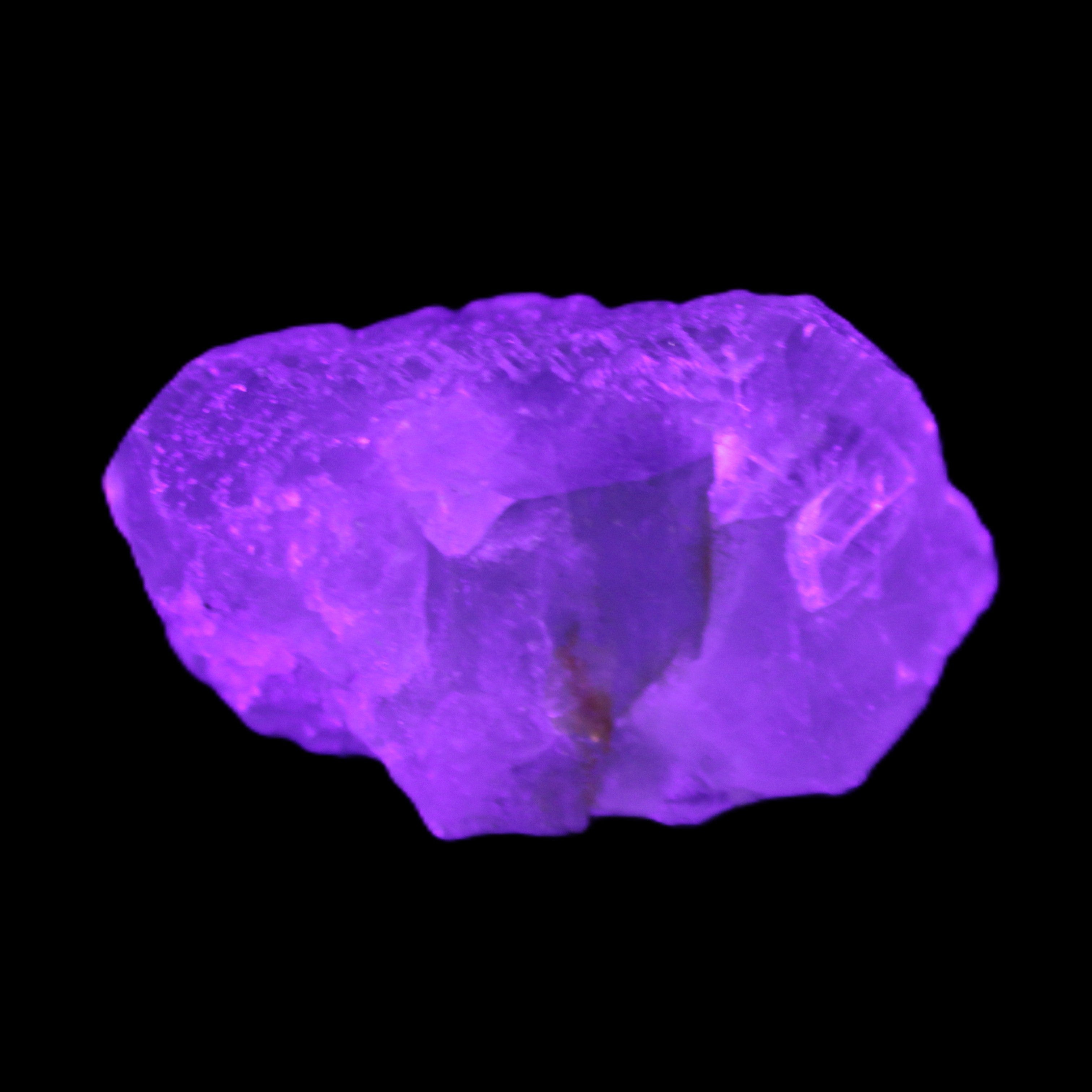 Green Phantom Fluorite crystal from China 60g in UV light - Rocks and Things Store