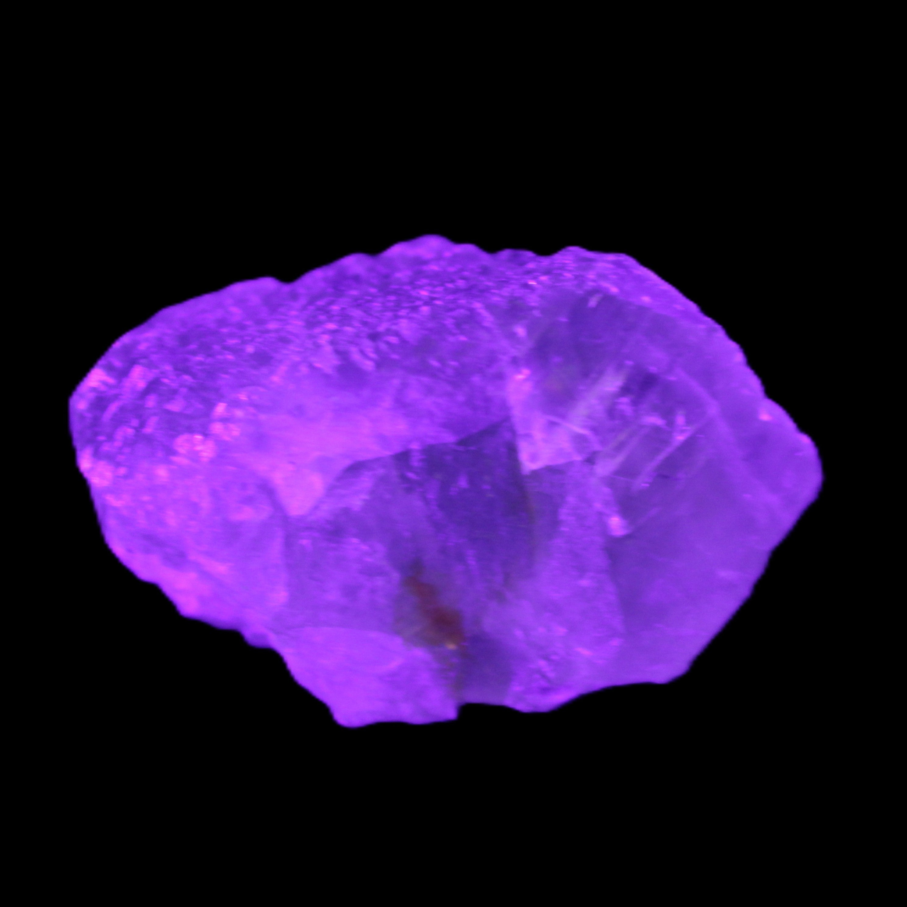 Green Phantom Fluorite crystal from China 60g in UV light - Rocks and Things Store