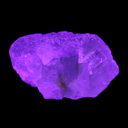 Green Phantom Fluorite crystal from China 60g in UV light - Rocks and Things Store