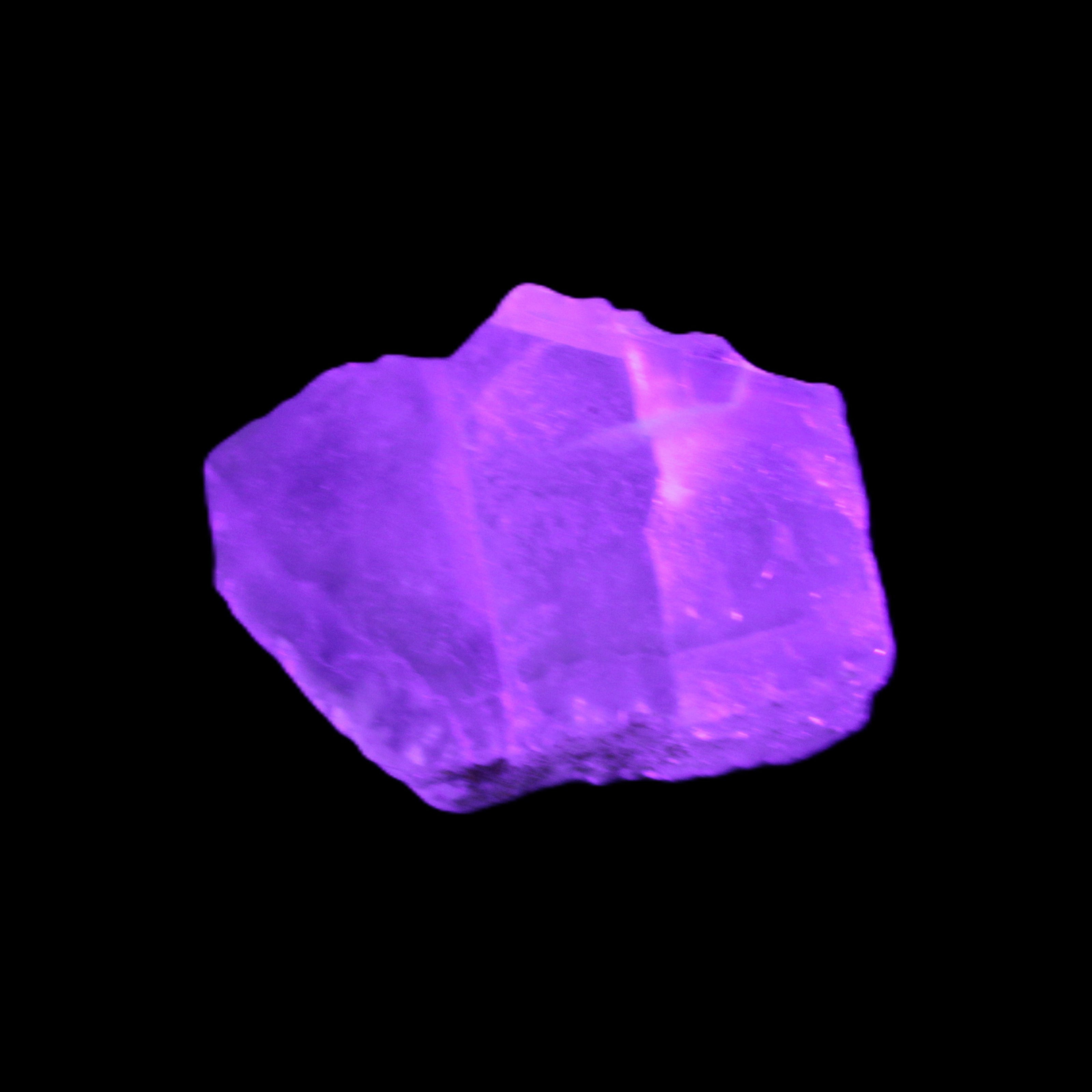 Green Phantom Fluorite crystal from China 60g in UV light - Rocks and Things Store