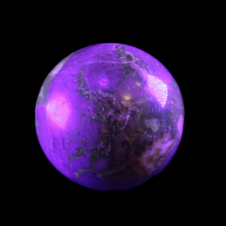 Septarian Dragon Stone sphere 51mm 192g in UV light - Rocks and Things Store