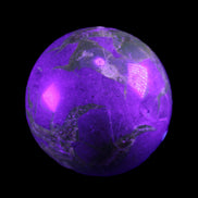 Septarian Dragon Stone sphere 51mm 192g in sunlight - Rocks and Things Store