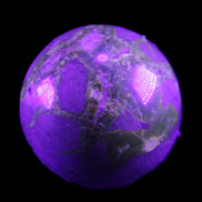 Septarian Dragon Stone sphere 51mm 192g in sunlight - Rocks and Things Store