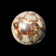 Septarian Dragon Stone sphere 51mm 192g in sunlight - Rocks and Things Store