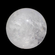 Ghost Garden Quartz sphere 57mm 266g in sunlight - Rocks and Things Store