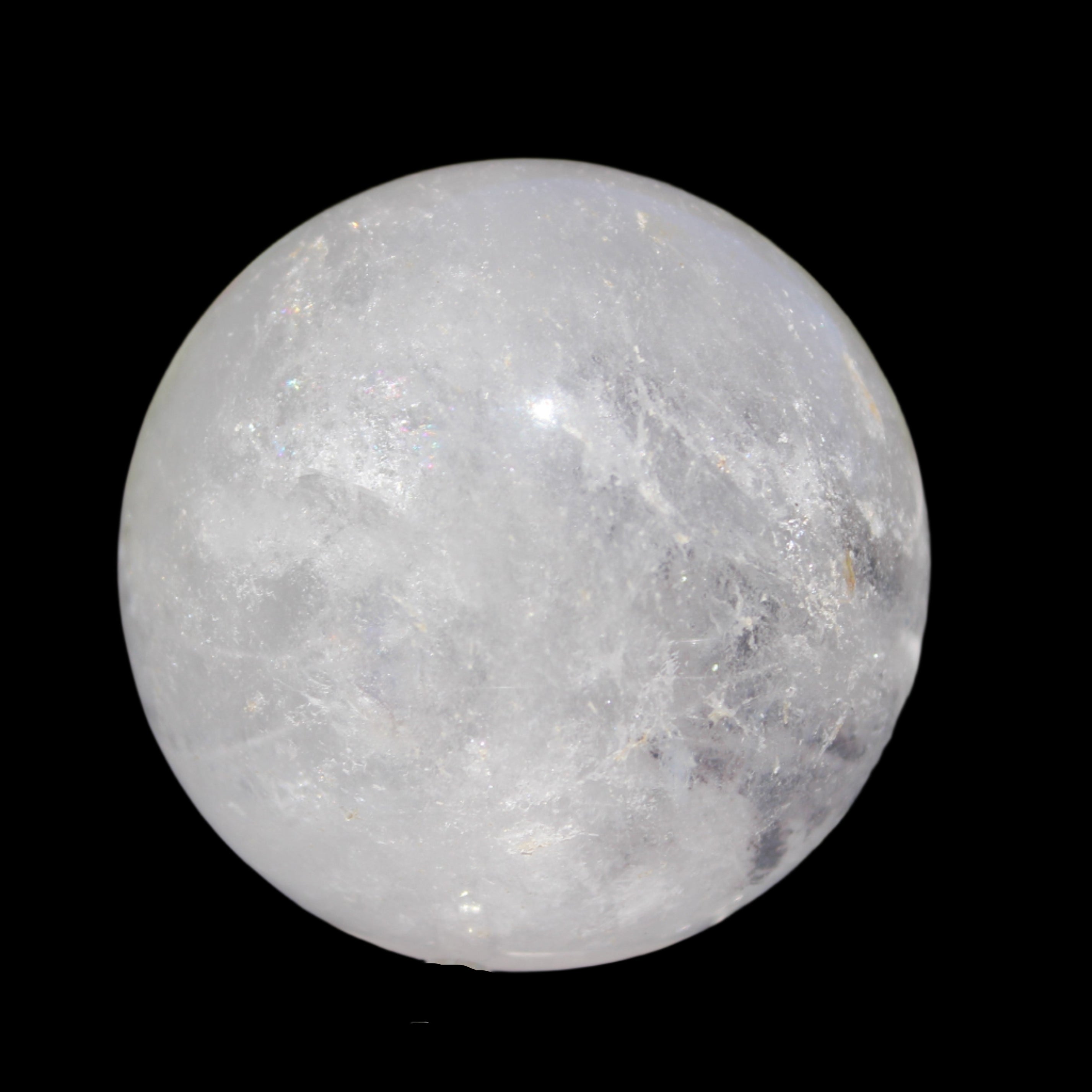 Ghost Garden Quartz sphere 57mm 266g in sunlight - Rocks and Things Store