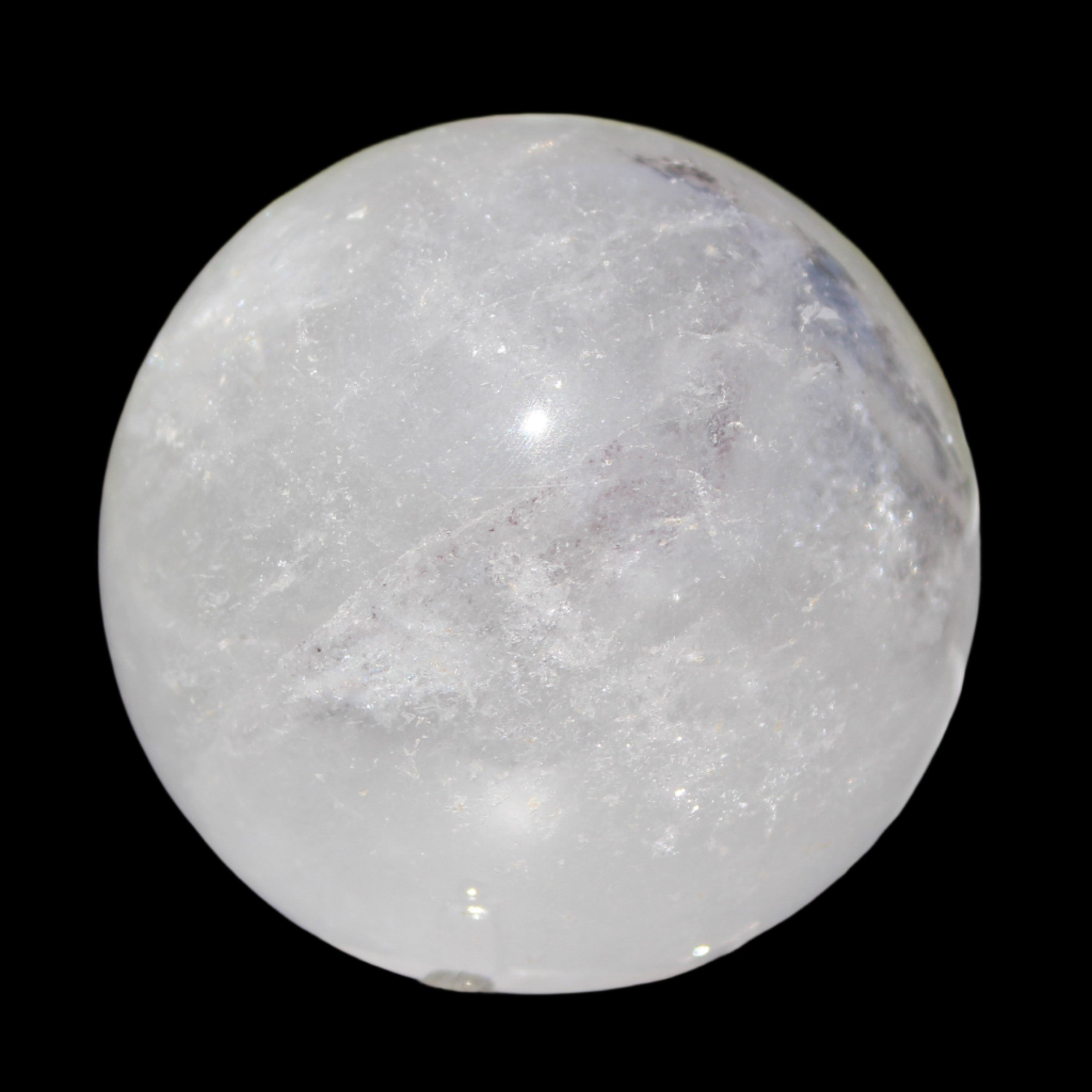 Ghost Garden Quartz sphere 57mm 266g in sunlight - Rocks and Things Store