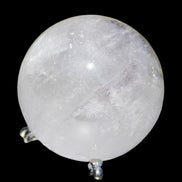 Ghost Garden Quartz sphere 57mm 266g in sunlight - Rocks and Things Store