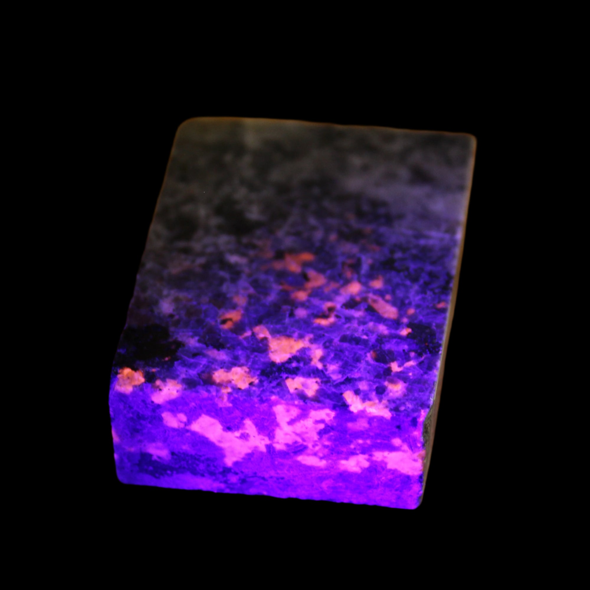 Yooperlite Lake Superior Sodalite 147g in UV light - Rocks and Things Store