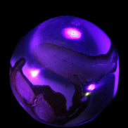 Marine Jasper sphere 45mm 126g Rocks and Things Store in UV light