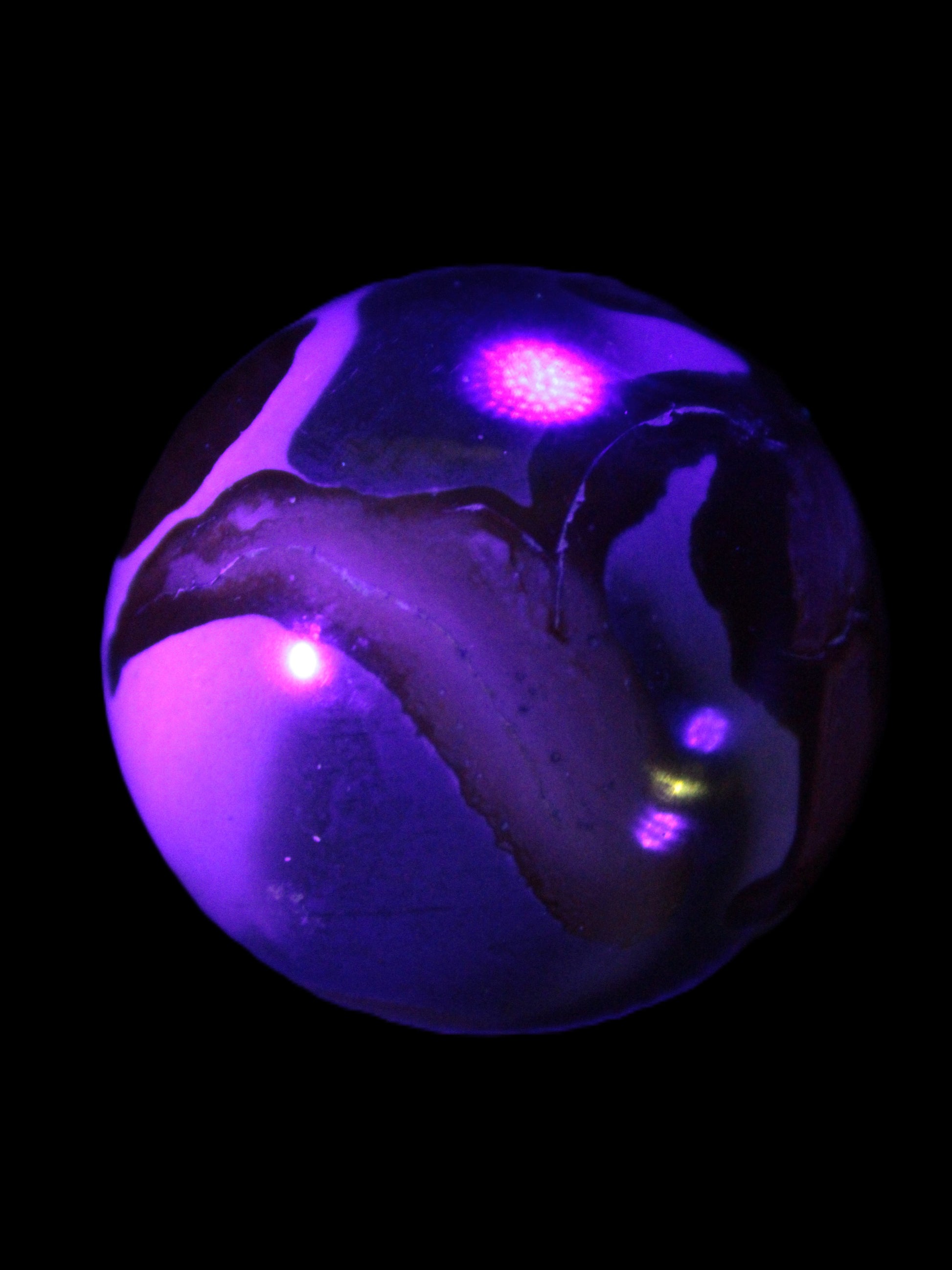 Marine Jasper sphere 45mm 126g Rocks and Things Store in UV light